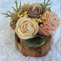 Warm Neutral Artisan Flower Candle Pot on Rustic Wooden Base
